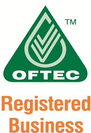 Green triangle logo with a drop shape and checkmarks inside, labeled "OFTEC." Below, orange text reads "Registered Business." Indicates official registration with OFTEC.